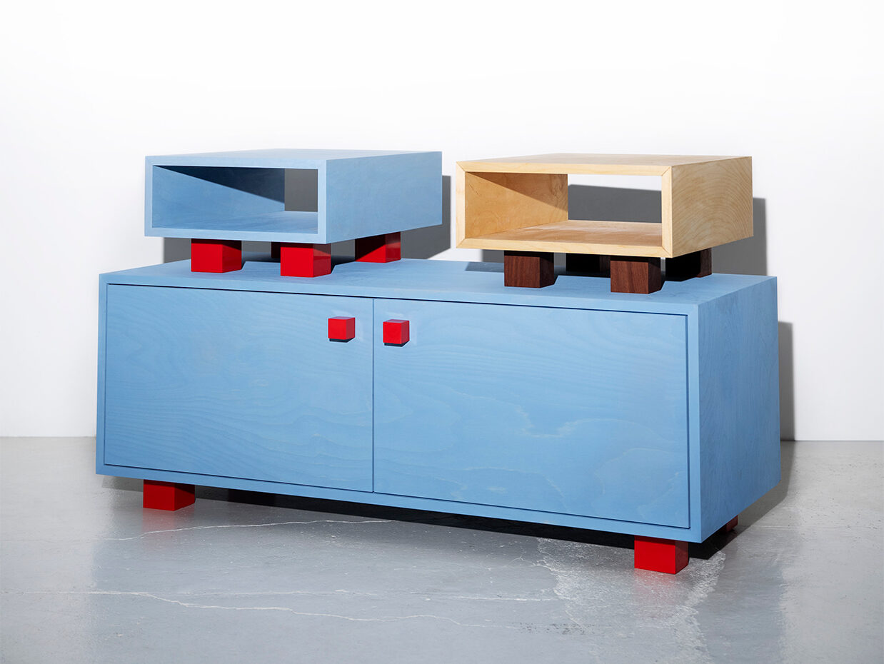 object design - Studio Gerritsen-Bart Four legged design cabinet wide, blue cabinet, red legs and handles