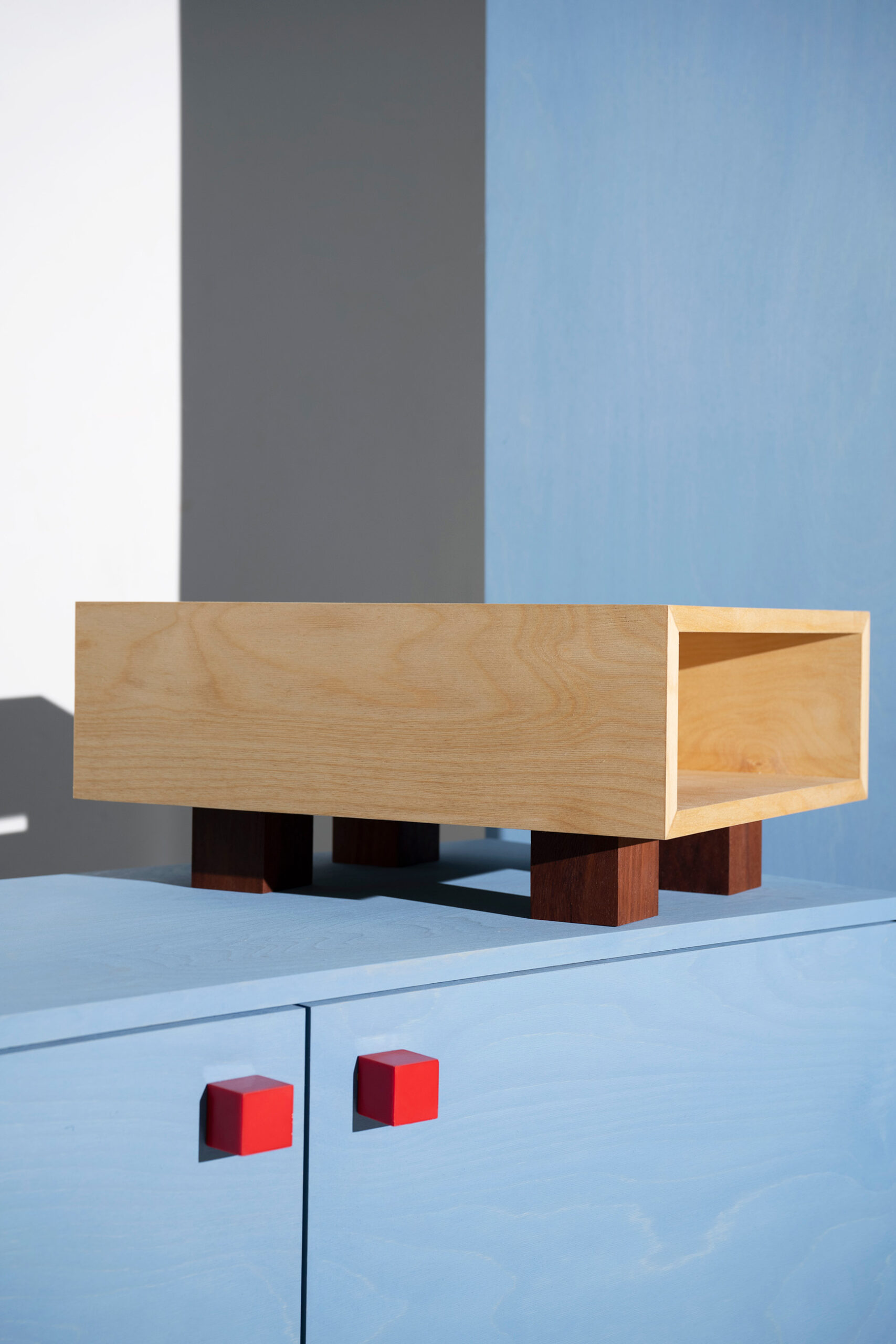 object design - Studio Gerritsen-Bart Natural Four Legged cabinet on funky blue design cabinet with epoxy handles and legs with open doors - Four Legged Cabinet Series