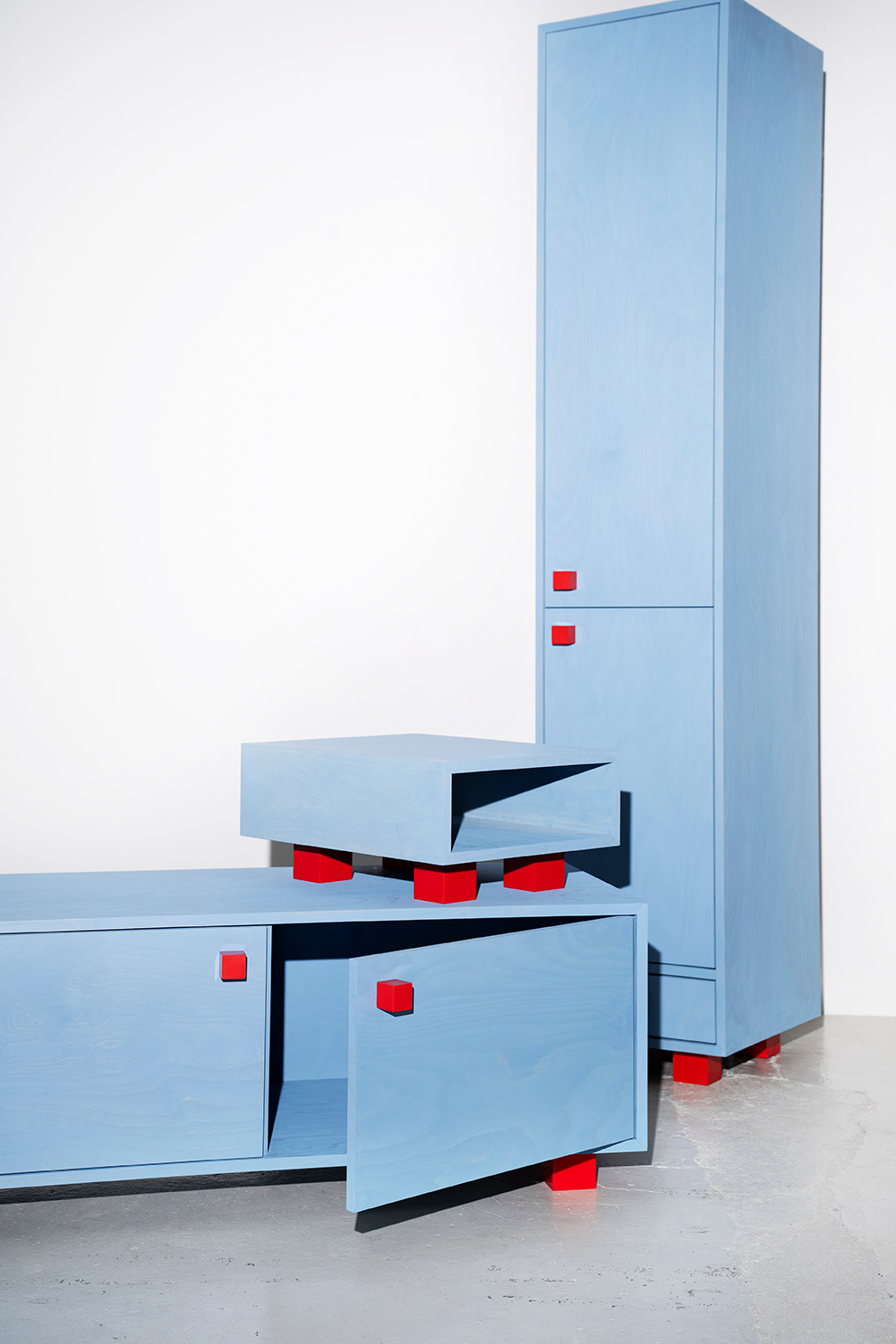 object design - Studio Gerritsen-Bart composition of funky blue design cabinets with epoxy handles and legs - Four Legged Cabinet