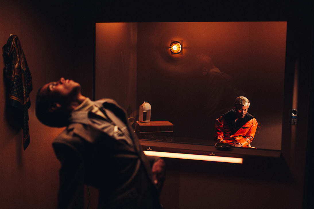 art direction and set design - Studio Gerritsen-Bart artist Tim Wes in a leather tiger suit with dancing man in front of him through a window